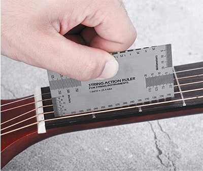 Um calibre de acção de guitarra