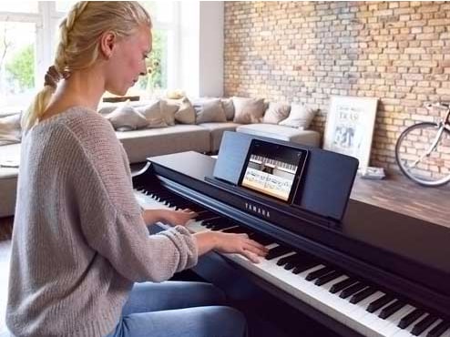 Aulas de piano Flowkey