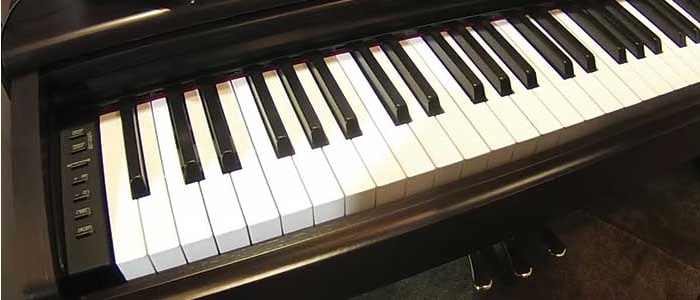 O Arius Yamaha YDP-144 Piano Digital